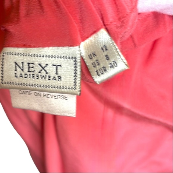 Pinkish Orange silk relaxed fit shorts. - Picture 4 of 6